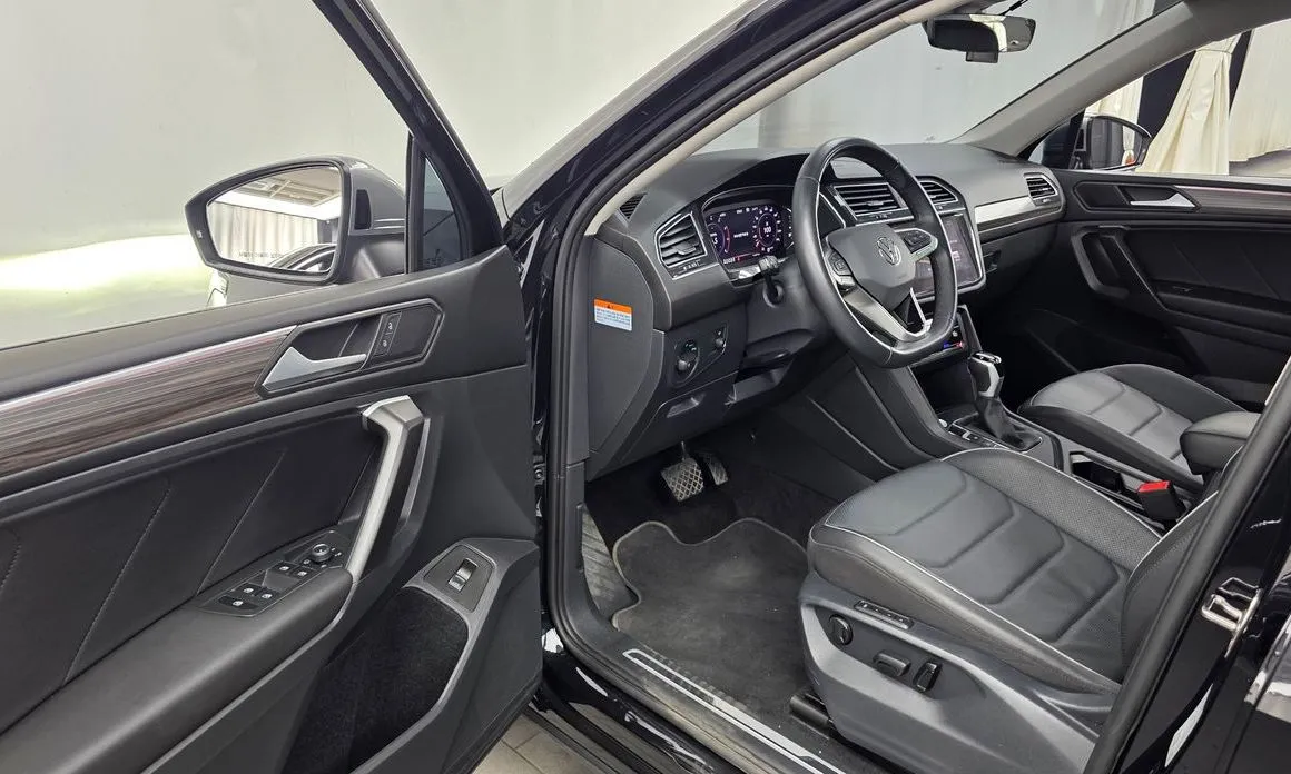 Volkswagen Tiguan — фото 8