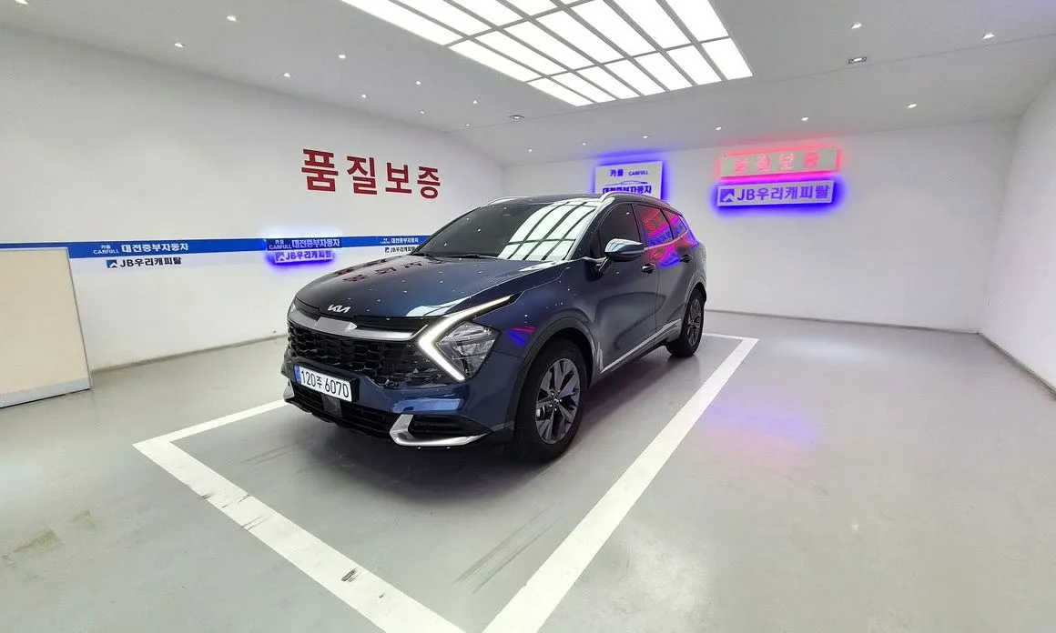 Kia Sportage — фото 1