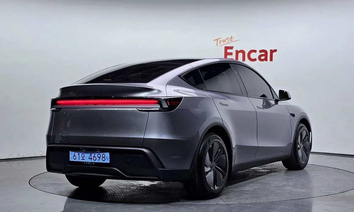 Tesla Model Y — фото 8