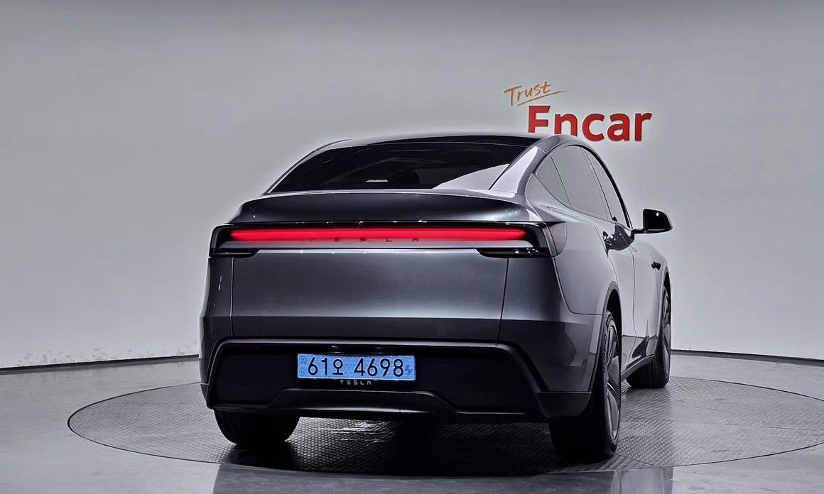 Tesla Model Y — фото 10