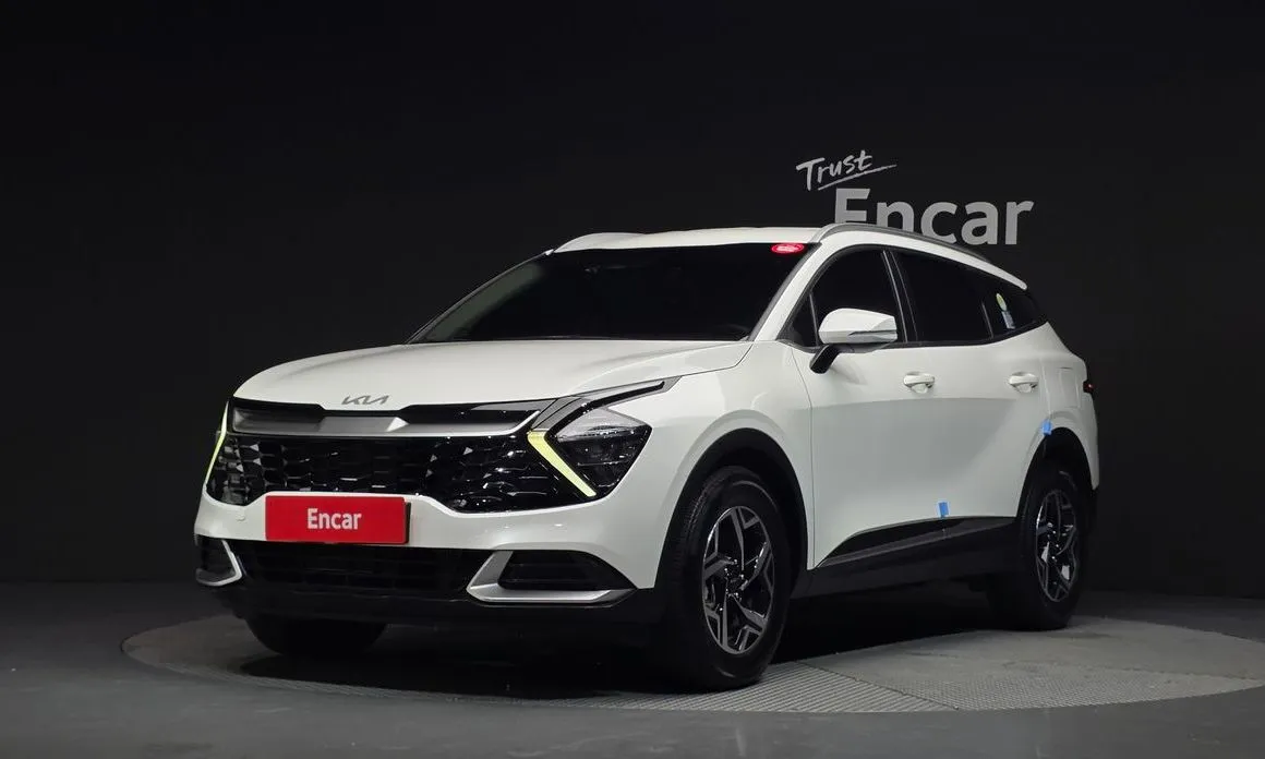 Kia Sportage — фото 1