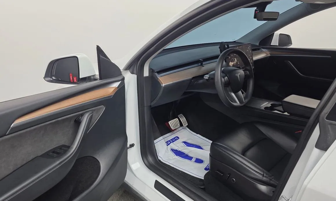 Tesla Model Y — фото 3