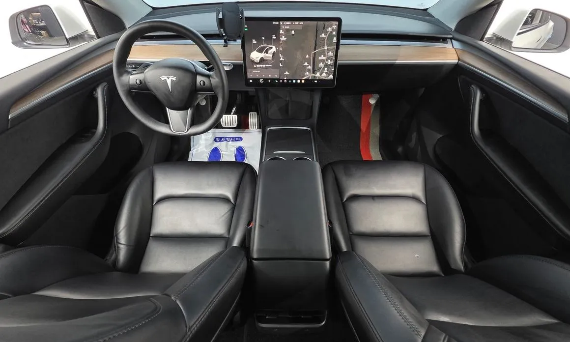 Tesla Model Y — фото 7