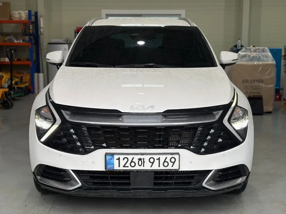 Kia Sportage — фото 1
