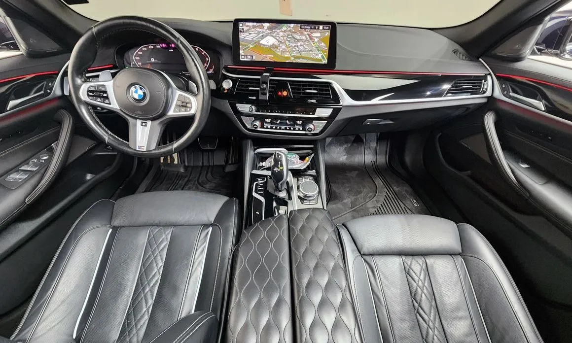BMW 5-Series — фото 10
