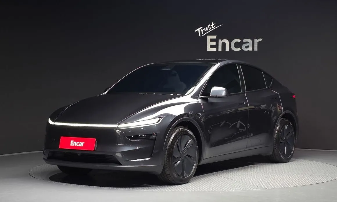 Tesla Model Y — фото 1