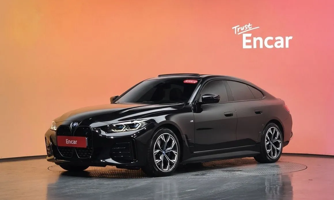 BMW i4 — фото 1