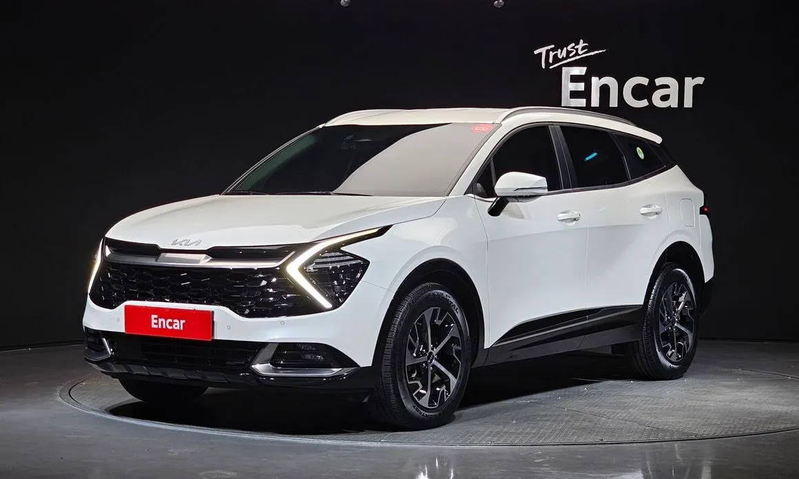 Kia Sportage — фото 1