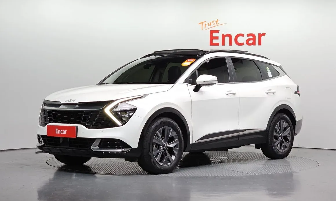 Kia Sportage — фото 1
