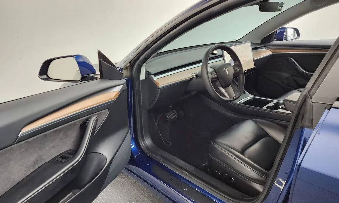 Tesla Model 3 — фото 3