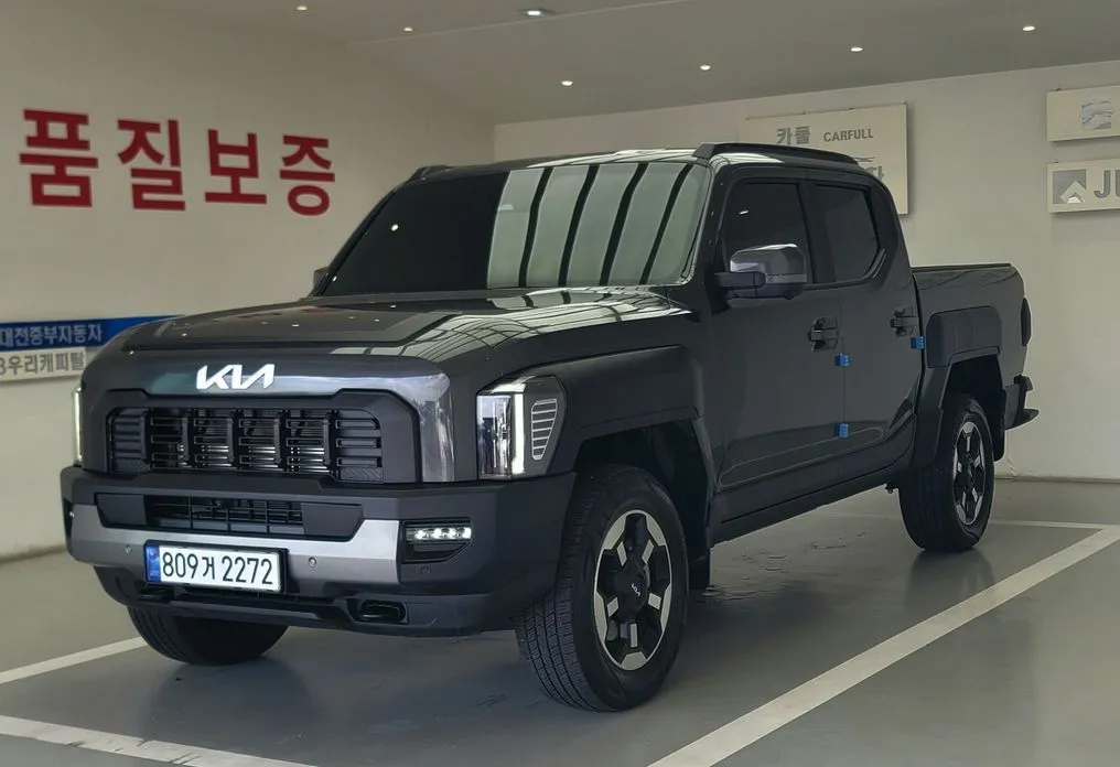Kia Tasman — фото 1