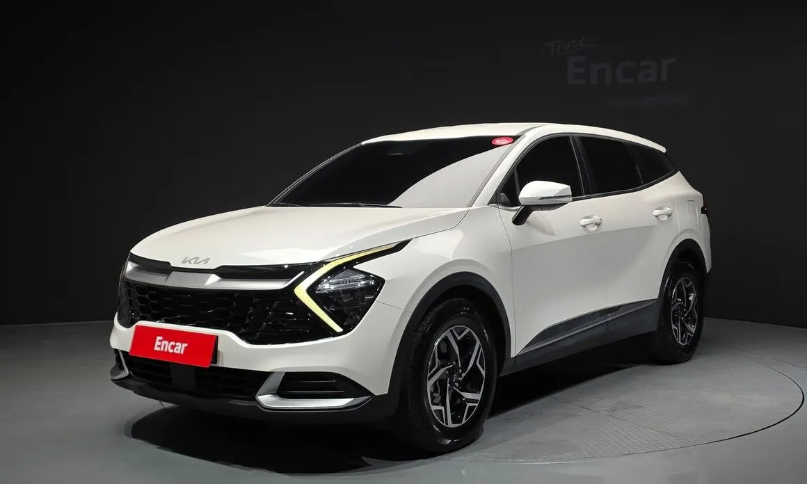 Kia Sportage — фото 1