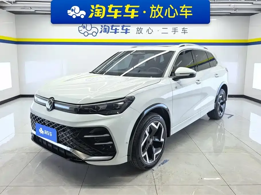 Volkswagen Tiguan L — фото 1