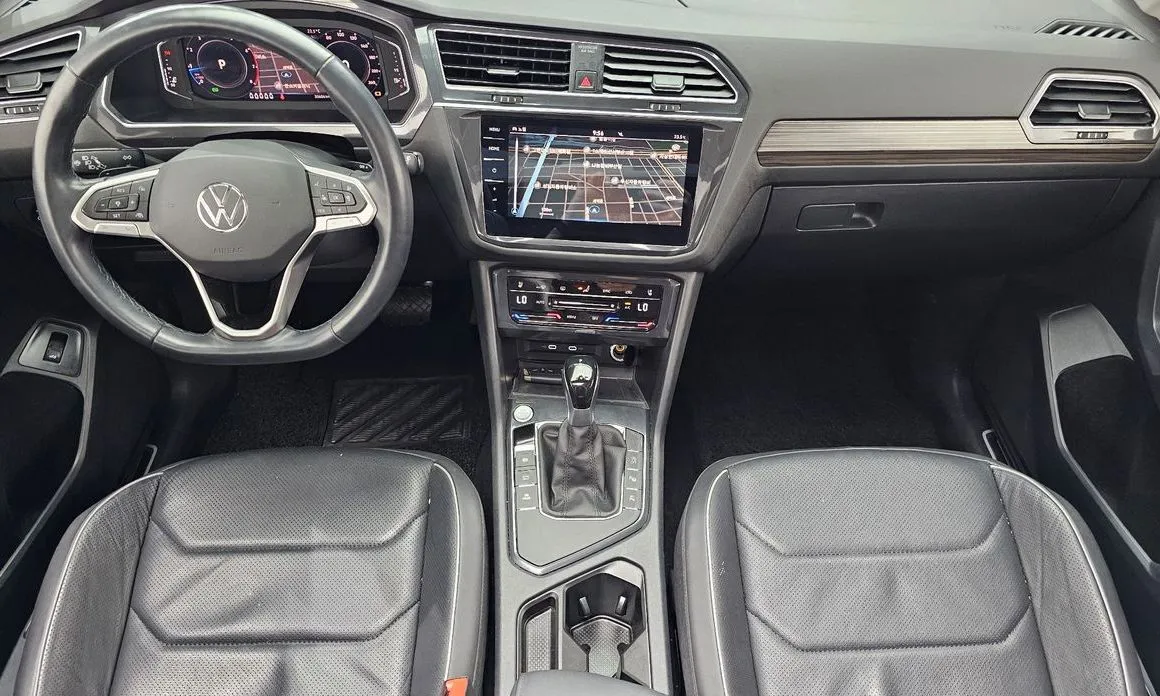 Volkswagen Tiguan — фото 10