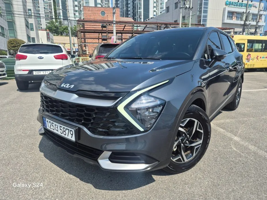 Kia Sportage — фото 1