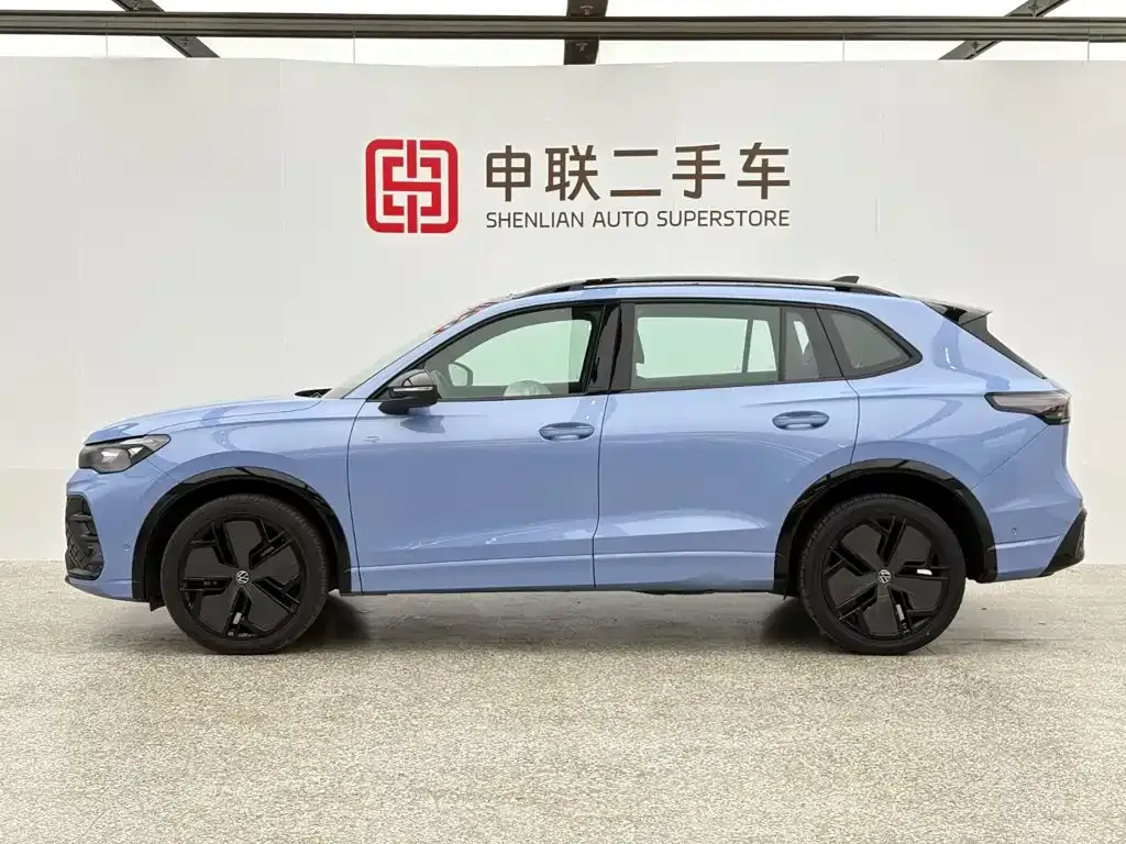 Volkswagen Tiguan L — фото 2