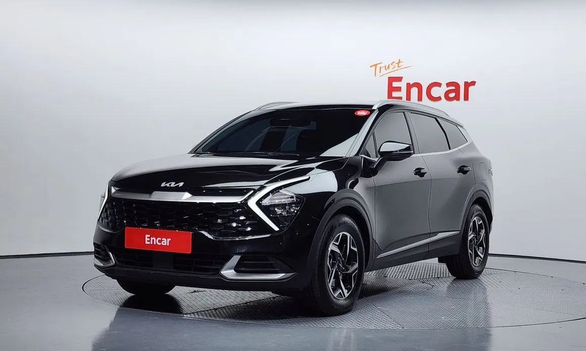 Kia Sportage — фото 1