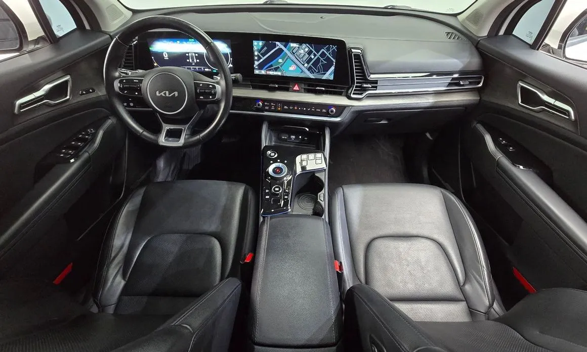 Kia Sportage — фото 9
