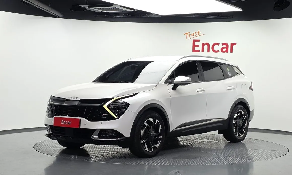 Kia Sportage — фото 1