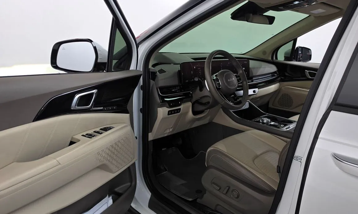 Kia Carnival — фото 9