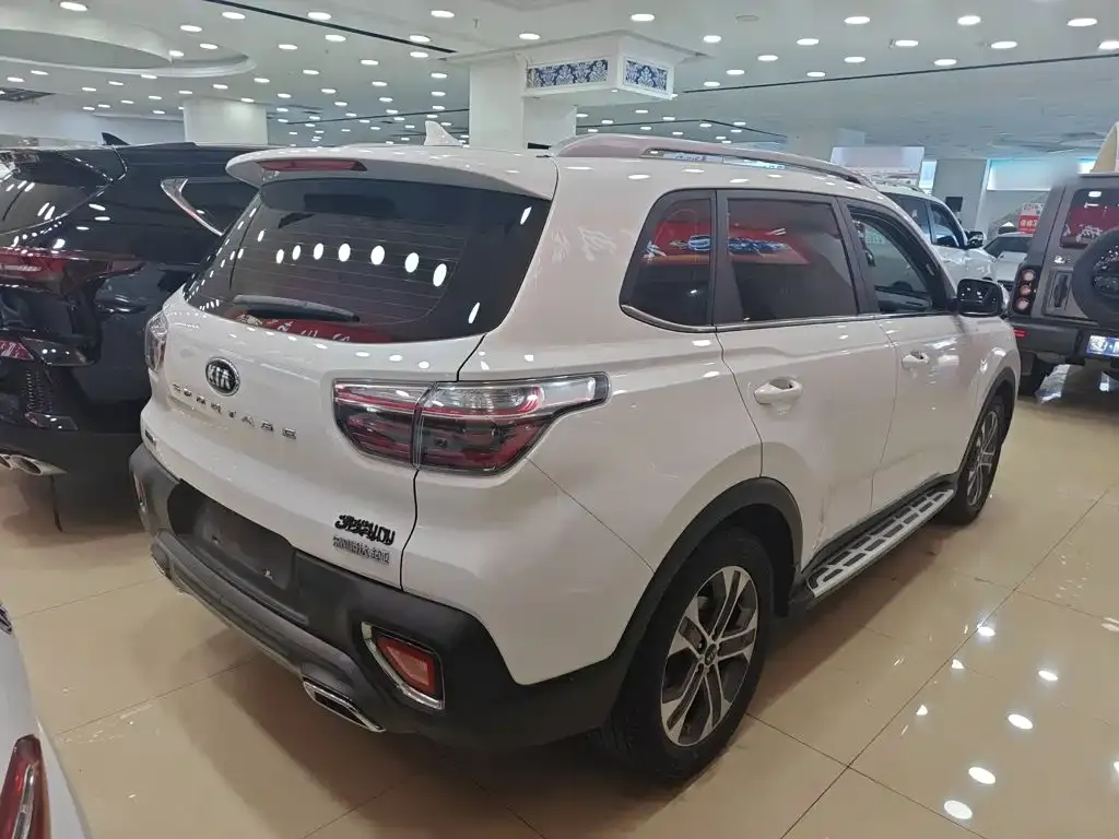 Kia Sportage — фото 10