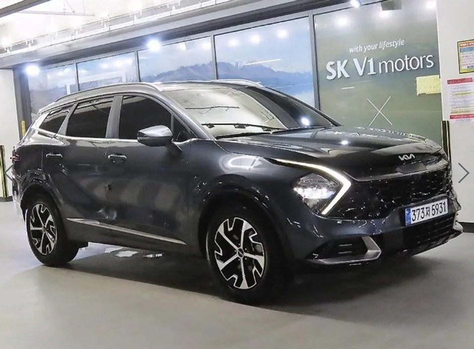 Kia Sportage — фото 1