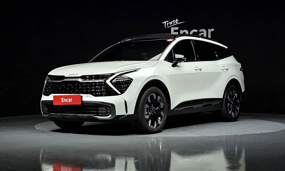 Kia Sportage — фото 1