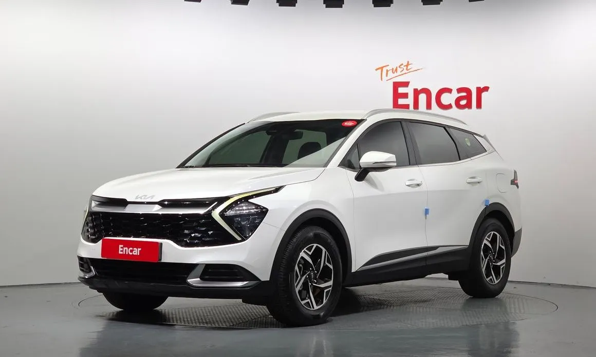 Kia Sportage — фото 1