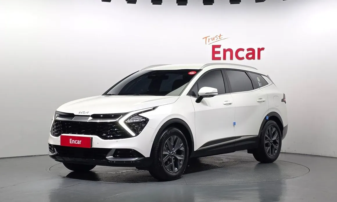 Kia Sportage — фото 1