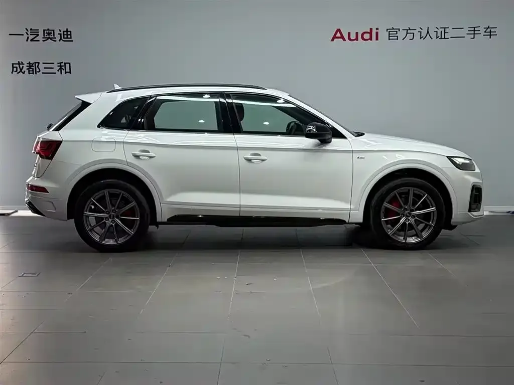 Audi Q5L — фото 5