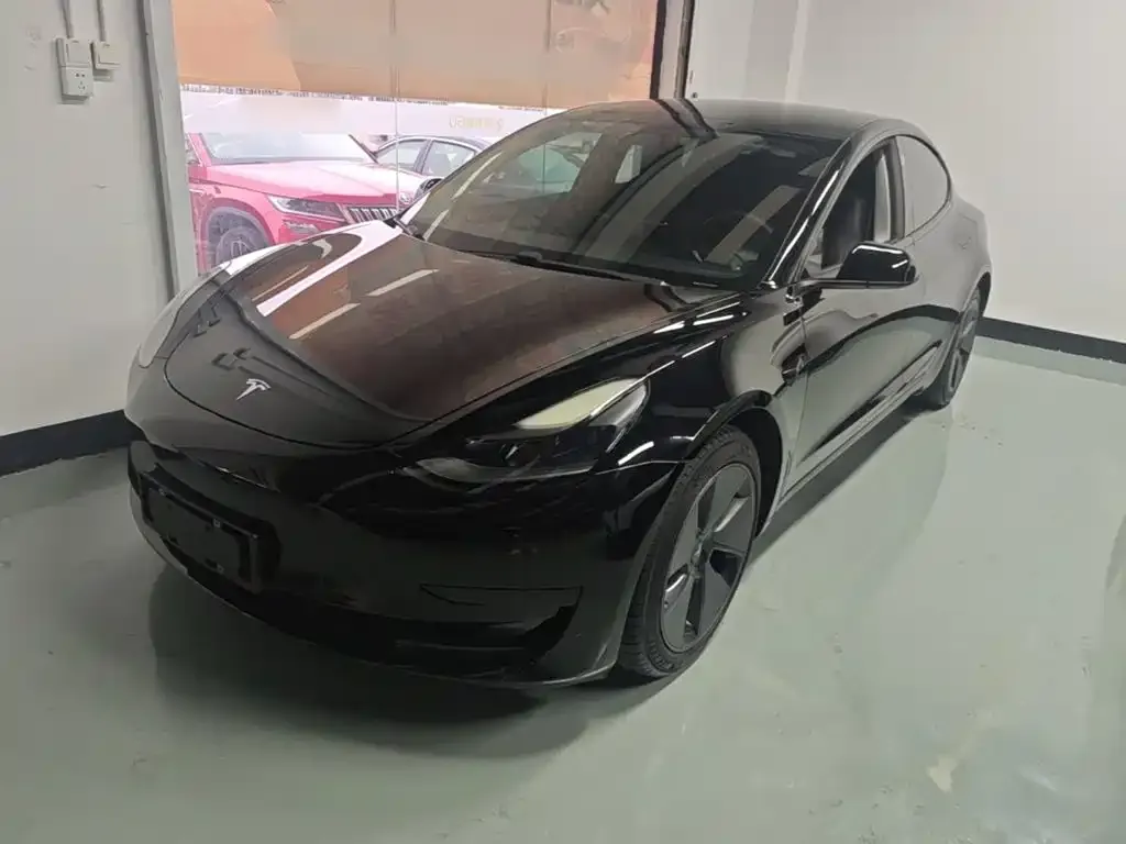 Tesla Model 3 — фото 7