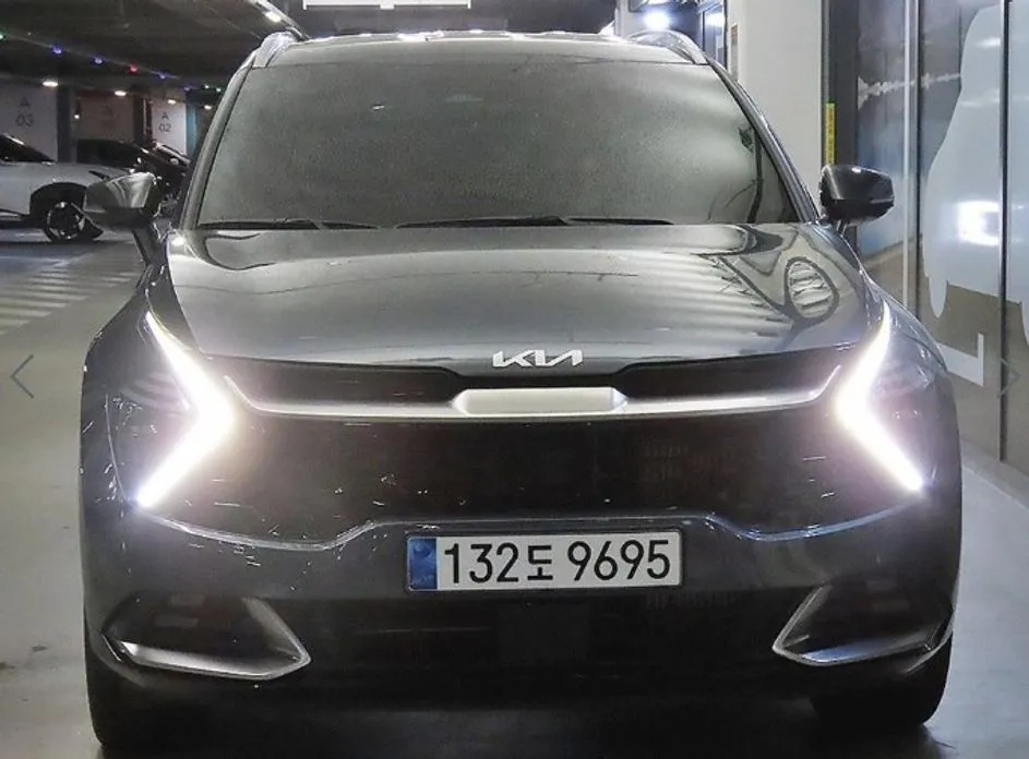 Kia Sportage — фото 1