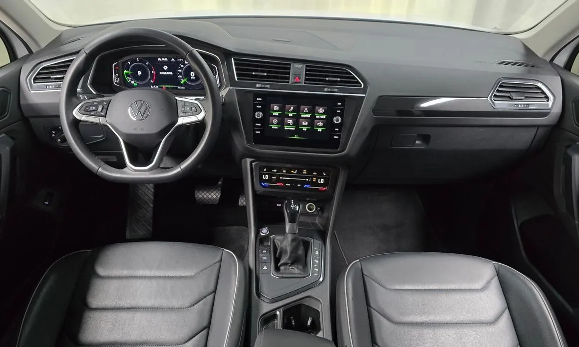 Volkswagen Tiguan — фото 10