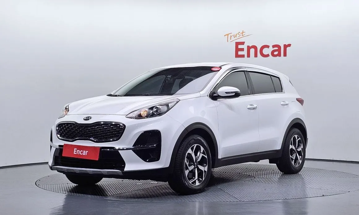 Kia Sportage — фото 1