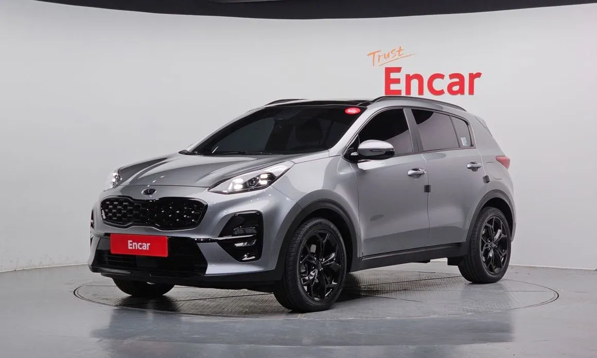 Kia Sportage — фото 1