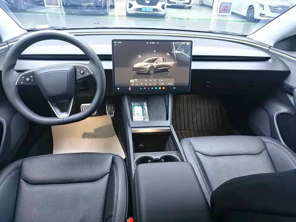 Tesla Model 3 — фото 7