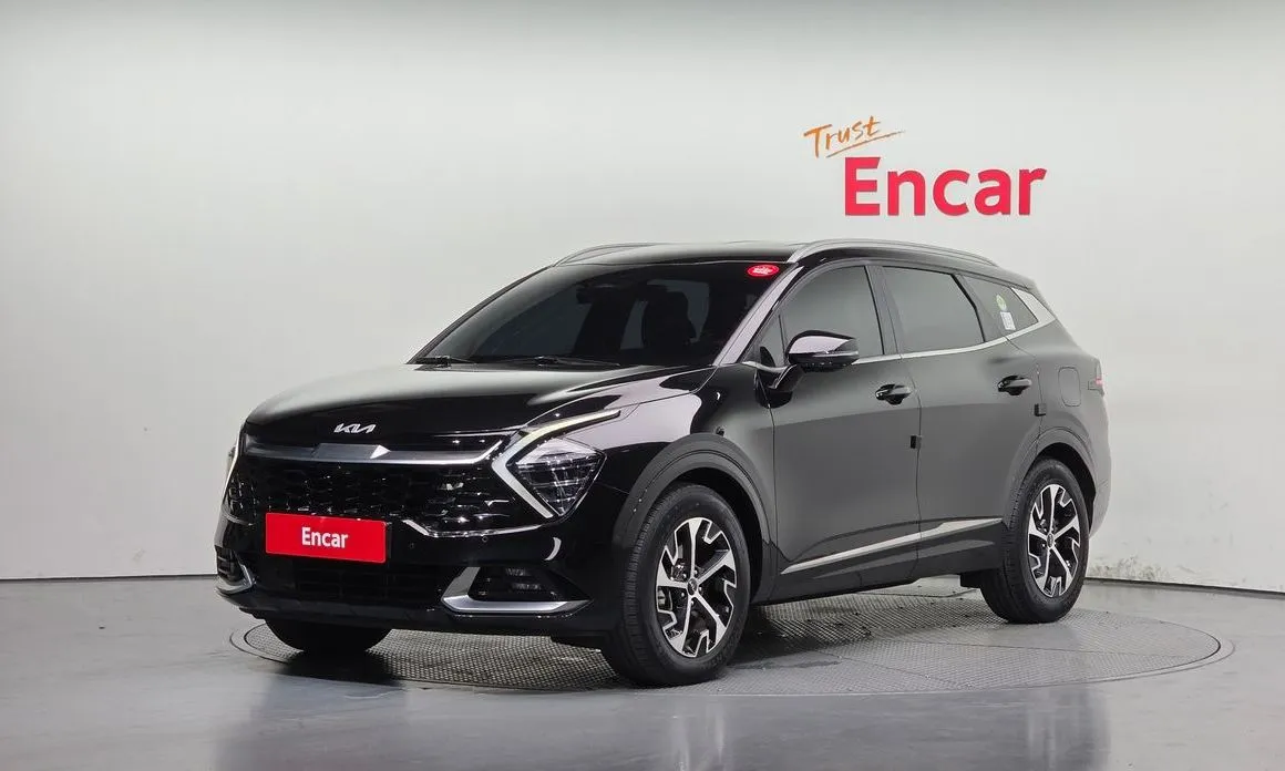 Kia Sportage — фото 1