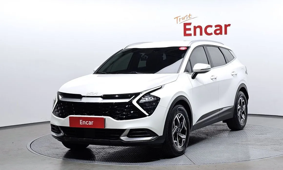 Kia Sportage — фото 1