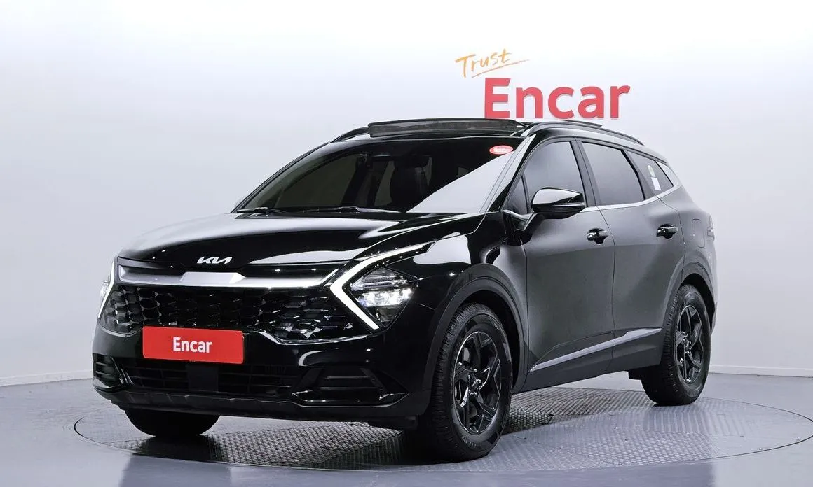 Kia Sportage — фото 1
