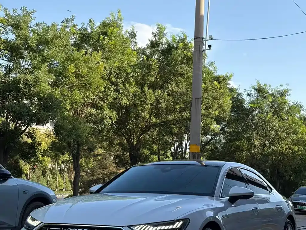 Audi A7L — фото 9