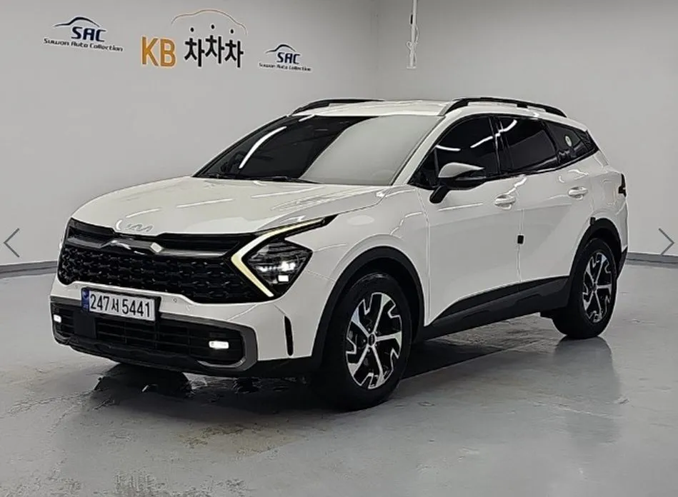 Kia Sportage — фото 1