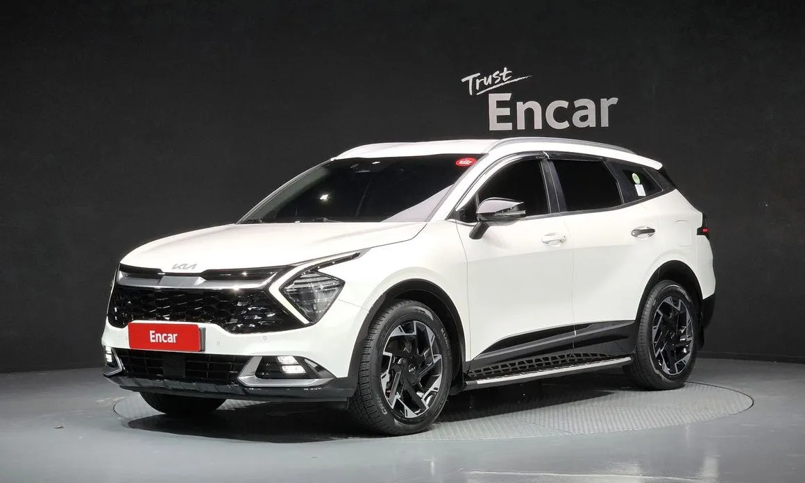 Kia Sportage — фото 1