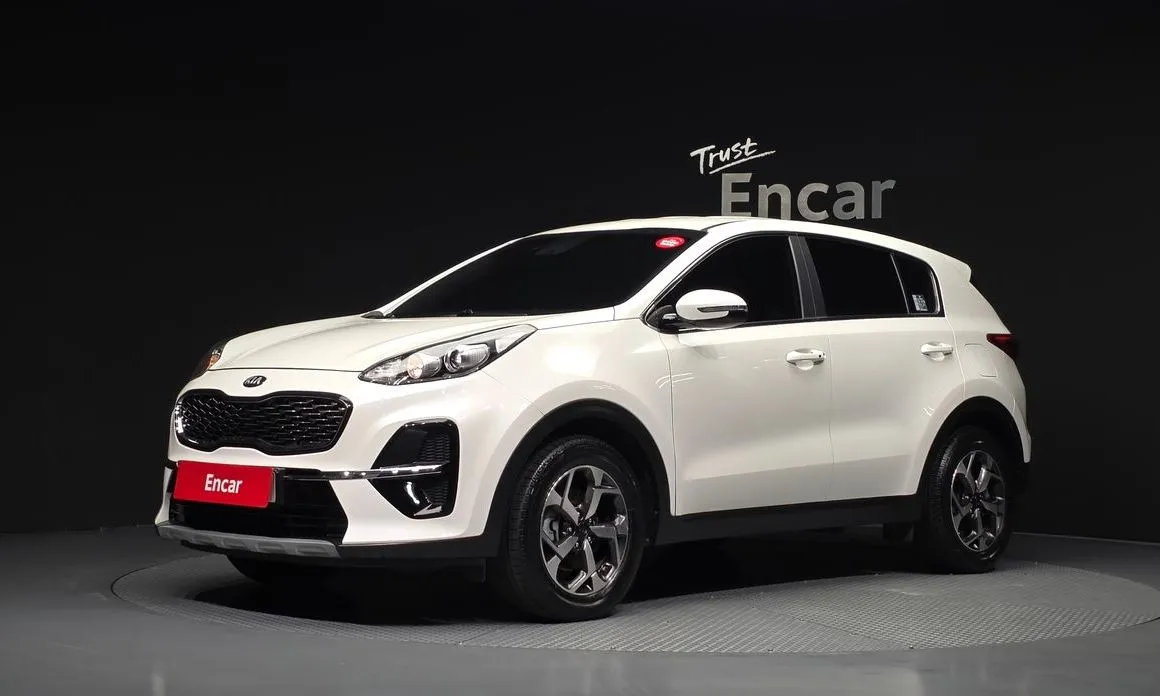 Kia Sportage — фото 1