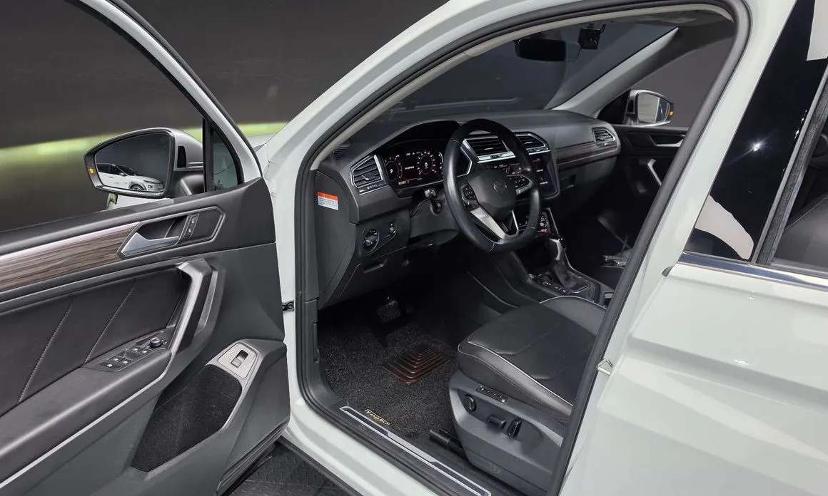 Volkswagen Tiguan — фото 10