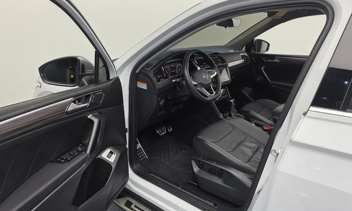 Volkswagen Tiguan — фото 6
