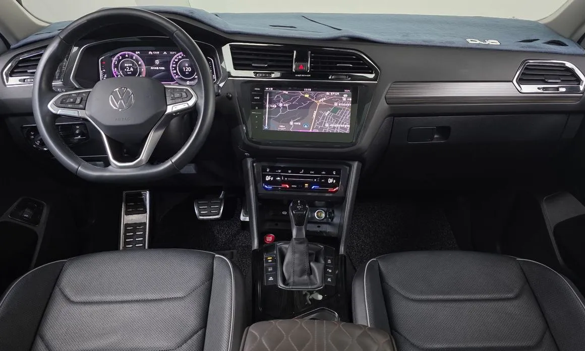 Volkswagen Tiguan — фото 7
