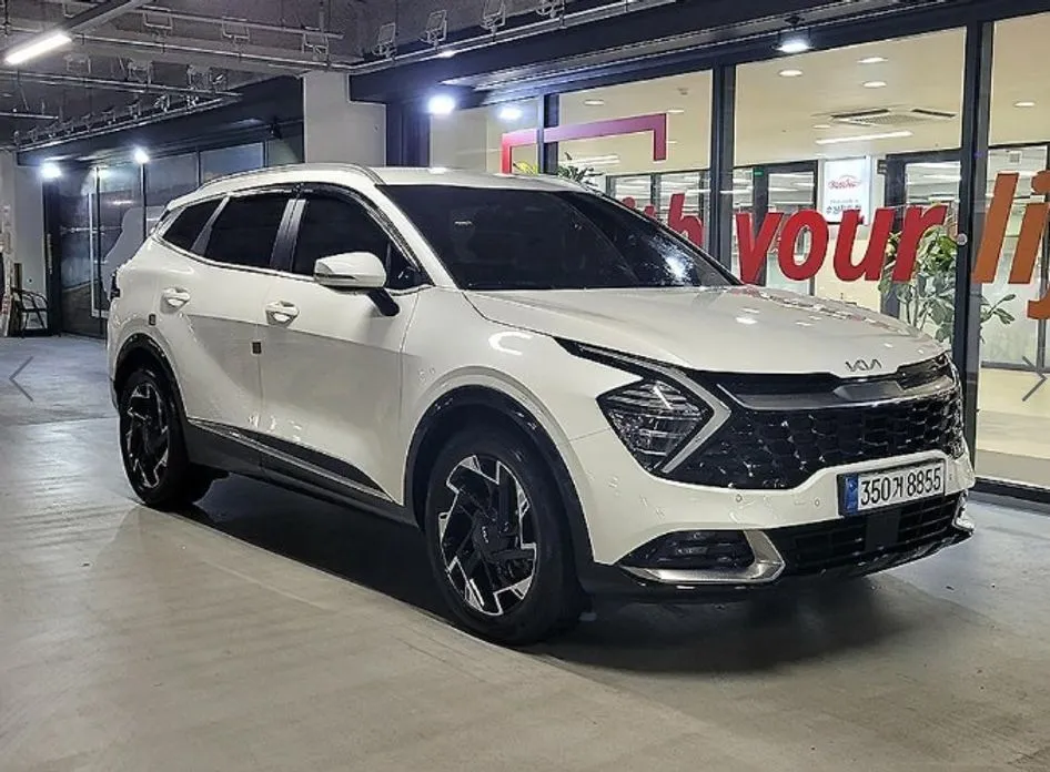 Kia Sportage — фото 1