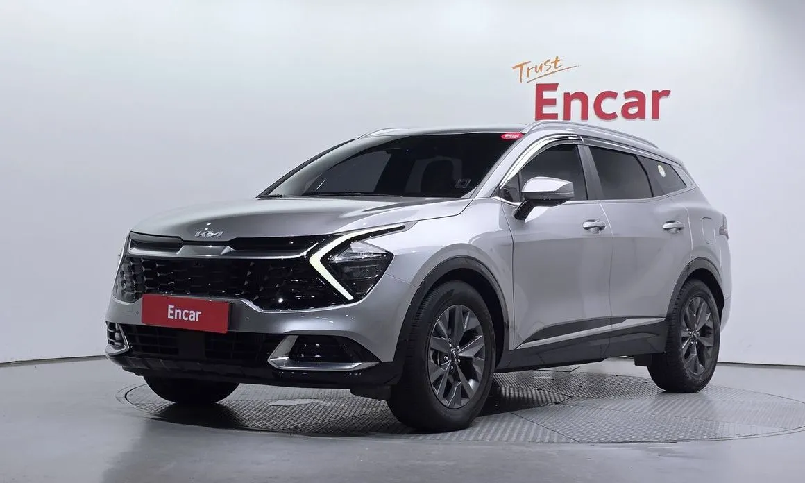 Kia Sportage — фото 1