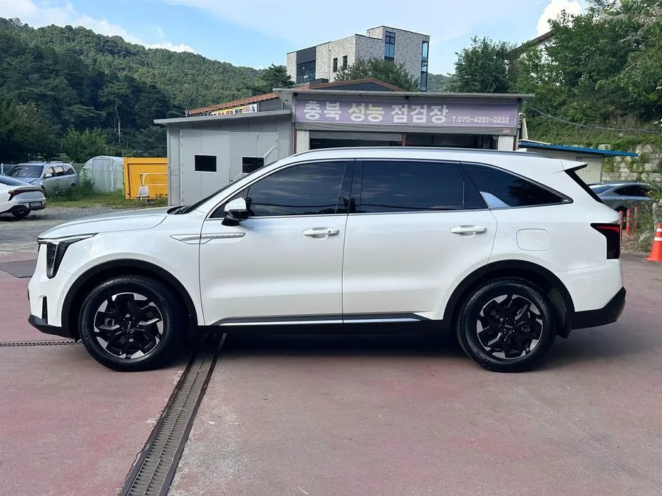 Kia Sorento — фото 7