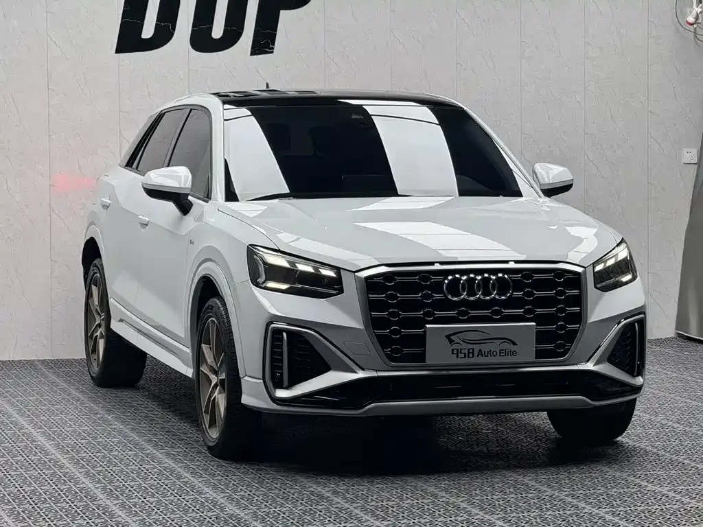 Audi Q2L — фото 9